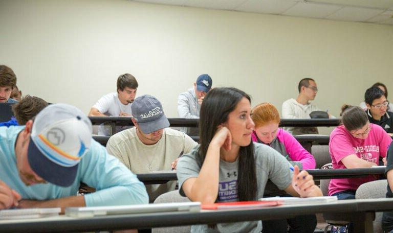 HSU students in lecture hall taking notes